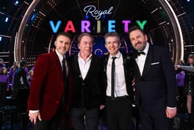 Gary Barlow, Andrew Lloyd Webber, Gareth Malone and Lee Mack pose onstage during the Royal Variety Performance 2022 at the Royal Albert Hall in London