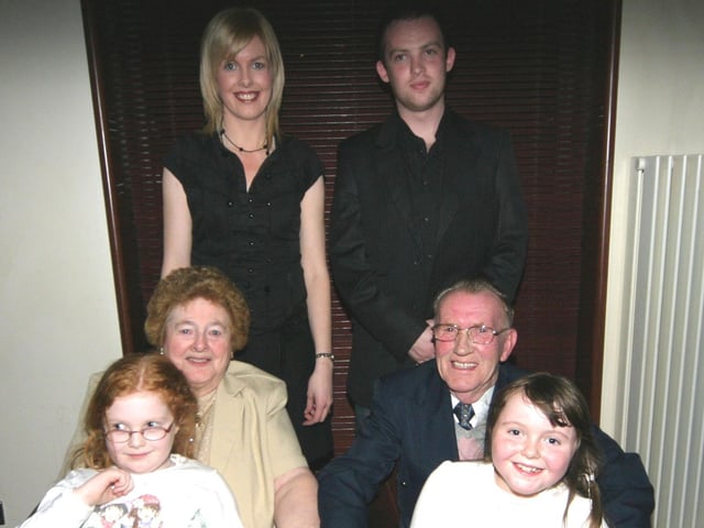 Willie and Kathleen celebrate their 50th Wedding Anniversary with grandchildren, Catherine, Shaun, Bronagh and great-granddaughter Caoimhe 0156JML : Parties and celebrations January 2006: Kathleen and Willie Quigley.