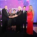 Claire Jones, Ciaran O’Neill, Marie Linton, Anne Marie O’Neill, JP Mc Cafferty and Laura Davies from Bishop’s Gate with Angelina Fusco (third from right).