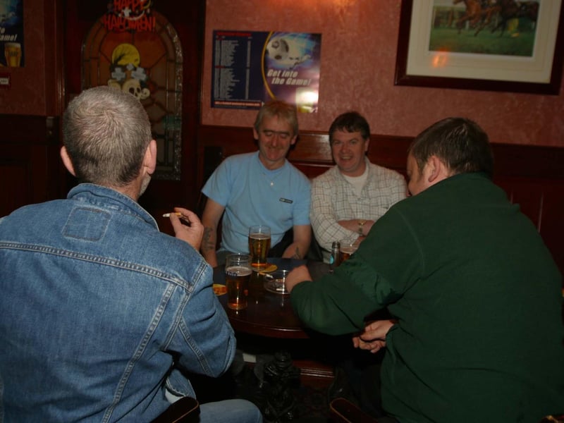 A few customers having a drink in their local Rocking Chair in 2004.