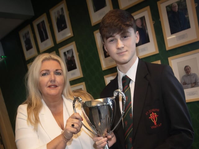 St. Joseph's Principal Mrs Ciara Deane presents Harley Nixon with the Class Award for Achievement and Commitment in Year 12.