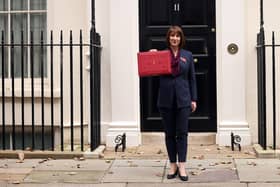 LONDON, ENGLAND - OCTOBER 30: Chancellor Rachel Reeves poses with the red box outside number 11 Downing Street on October 30, 2024 in London, England. This is the first Budget presented by the new Labour government and Chancellor of the Exchequer, Rachel Reeves. (Photo by Dan Kitwood/Getty Images)