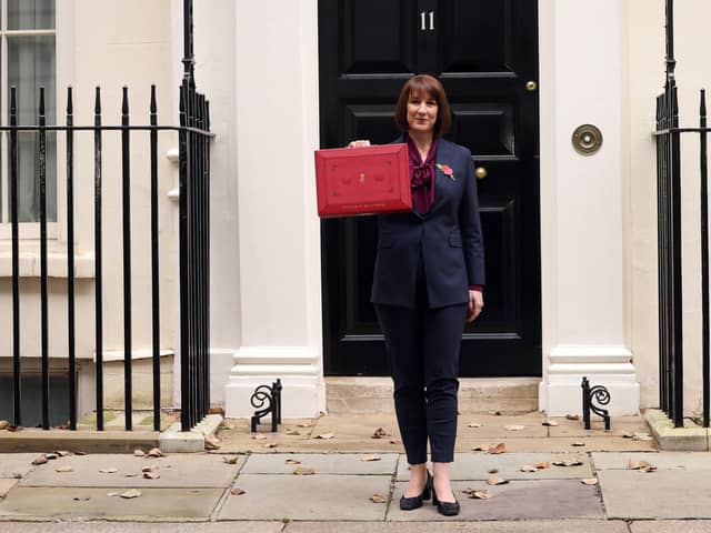 LONDON, ENGLAND - OCTOBER 30: Chancellor Rachel Reeves poses with the red box outside number 11 Downing Street on October 30, 2024 in London, England. This is the first Budget presented by the new Labour government and Chancellor of the Exchequer, Rachel Reeves. (Photo by Dan Kitwood/Getty Images)