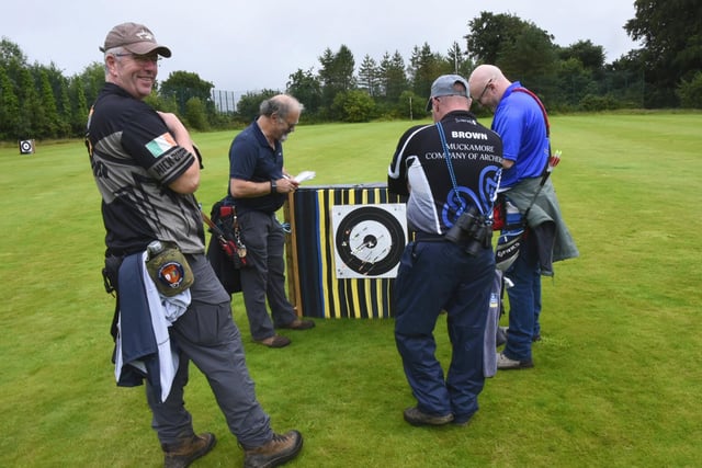CHECKING SCORES. . . . .Archers Mick Burke, Dom Bradley, Glen Broughall and Robin Brown pictured during Saturday's event.
