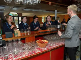 Benjimen, from the Everglades Hotel, demonstrates mocktail making to students from St Conor’s College, Clady, during the Springboard and TNI Hospitality and Tourism Roadshow held in the Everglades Hotel on Wednesday morning last. Photo: George Sweeney. DER2310GS – 026