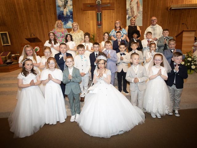 Pupils from Steelstown Primary School who received the Sacrament of First Holy Communion from Fr. McDevitt at Our Lady of Lourdes Church, Steelstown on Saturday last. (Photo: Jim McCafferty Photography)
