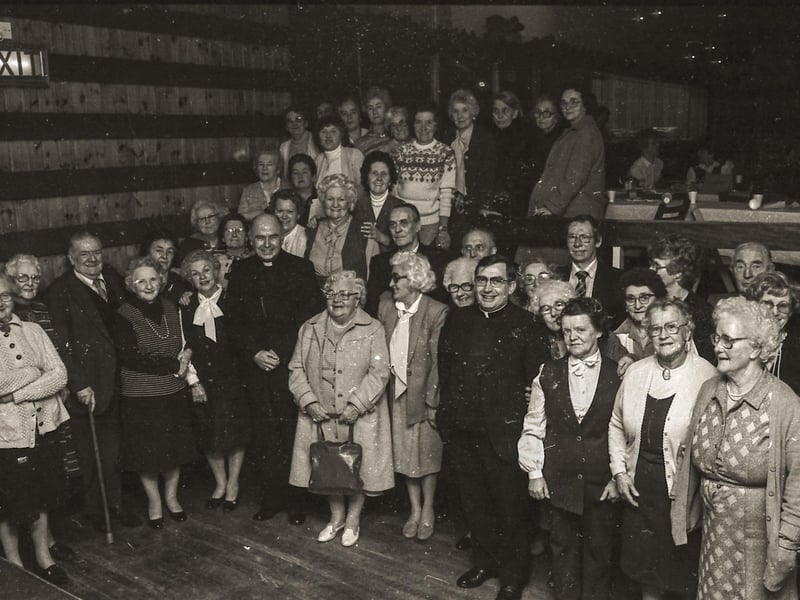 Residents with Bishop Edward Daly and other clergy at the St Eugene's Parish Senior Citizens Party in the parish hall.