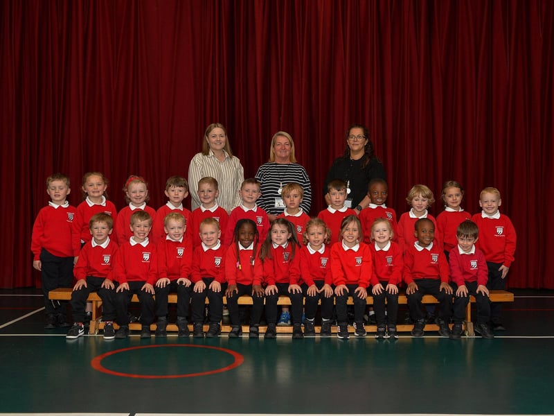Mrs Semple with her P1 class and classroom assistants at Drumahoe Primary School.