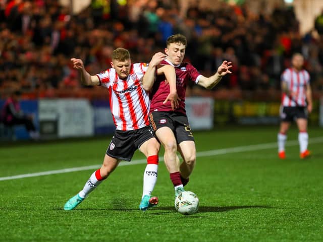Ronan Boyce battles for possession against Galway. Photo by Kevin Moore.