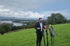 Colum Eastwood speaks to the press in Derry's Waterside yesterday.