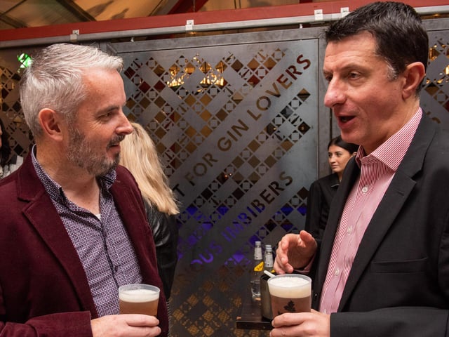 Odhran Dunne, Visit Derry and David Roberts, Tourism NI pictured at the opening of The Taproom at the Walled City Brewery. Picture Martin McKeown. 21.10.22.