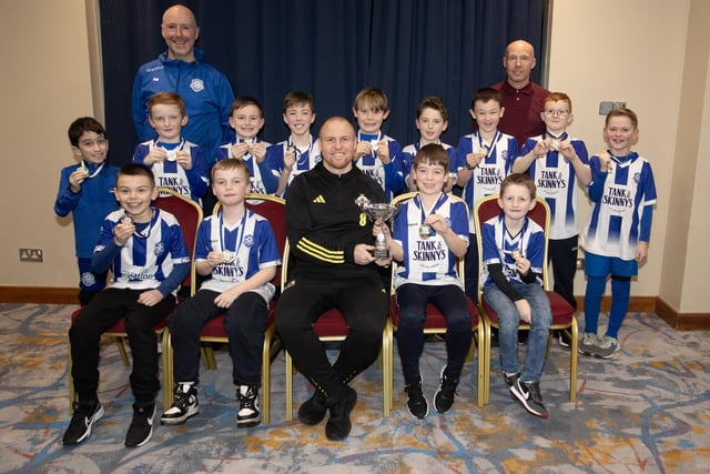 Ronan O'Donnell, Irish Football Association, special guest at the D&D Youth FA Annual Awards at the City Hotel on Friday night presents Culmore Youth FC U9s with the Summer Cup. Included are coaches Uel Watson and Ross Jackson-Forrest.