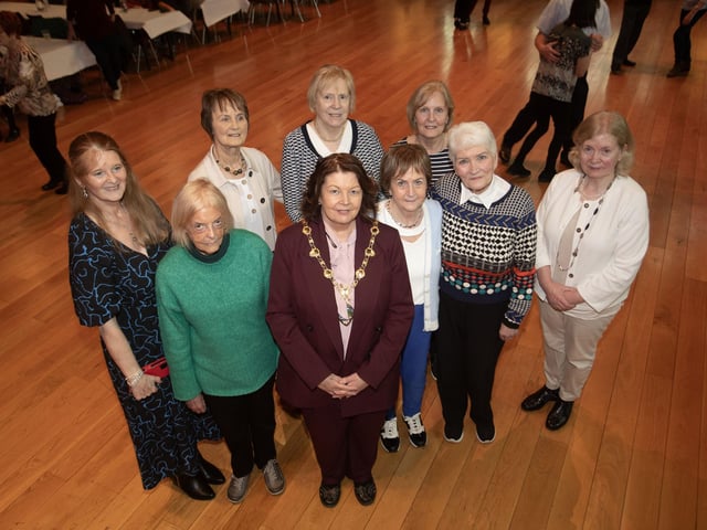 Agroup of retired nurses/social workers pictured with the Mayor, Patricia Logue at Wednesday's Tea Dance in the Guildhall.