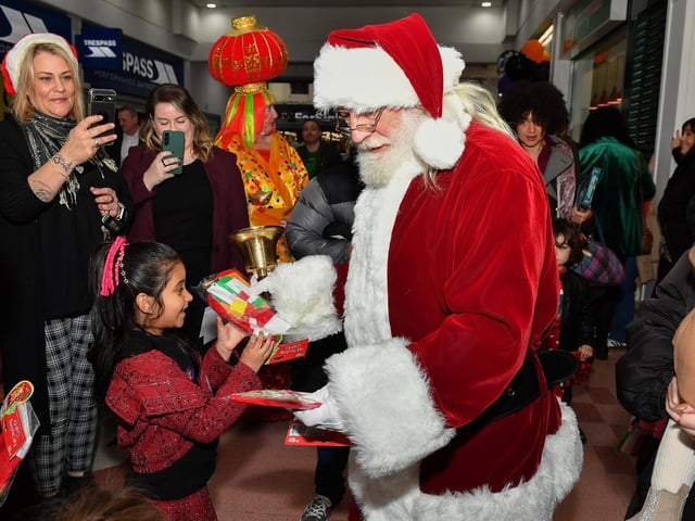 Santa arrives at the Richmond Shopping Centre on Saturday morning. Photo: George Sweeney