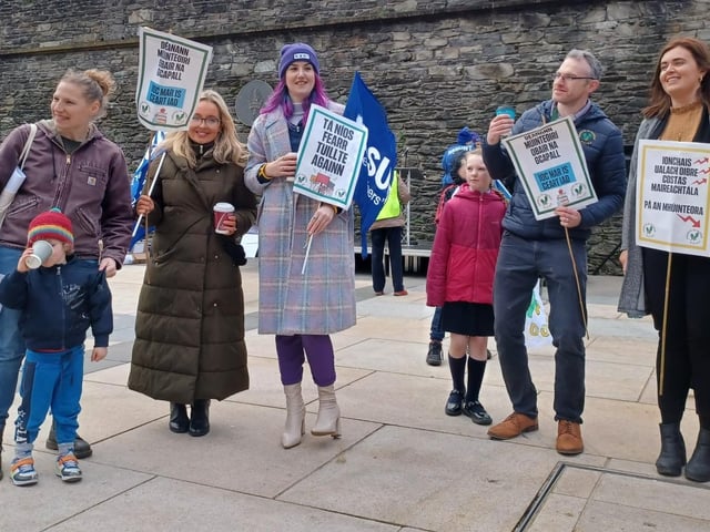 A group at the rally for pay and conditions.