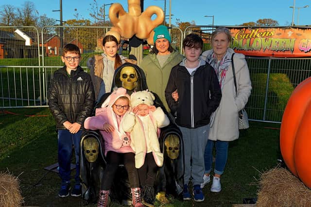 Members of the Rogers family pictured with Barney Bones at the Cullen's Halloween Funfair on Wednesday afternoon last. Photo: George Sweeney.  DER2243GS – 052