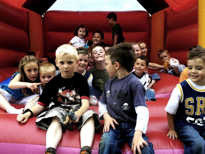 Shane and Shelbie pictured celebrating their birthdays with all their friends on the bouncy castle.