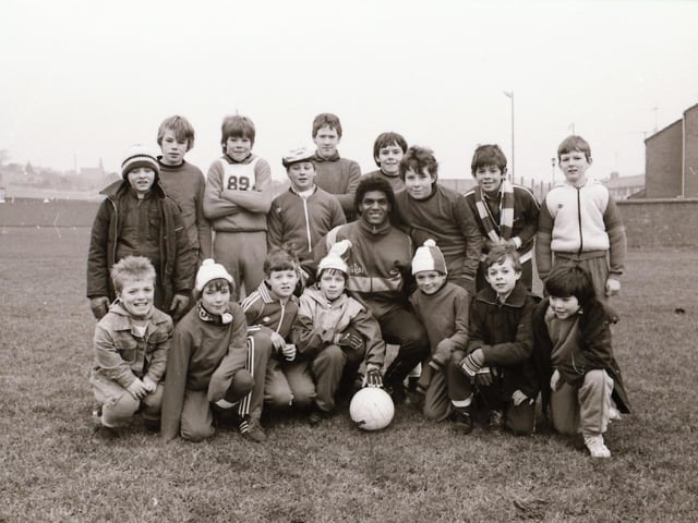 Derry City FC player Nelson Da Silva with ball boys.