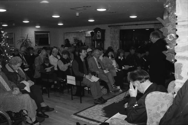 Attendees at a service of commemoration at the Foyle Hospice in Christmas 2000.