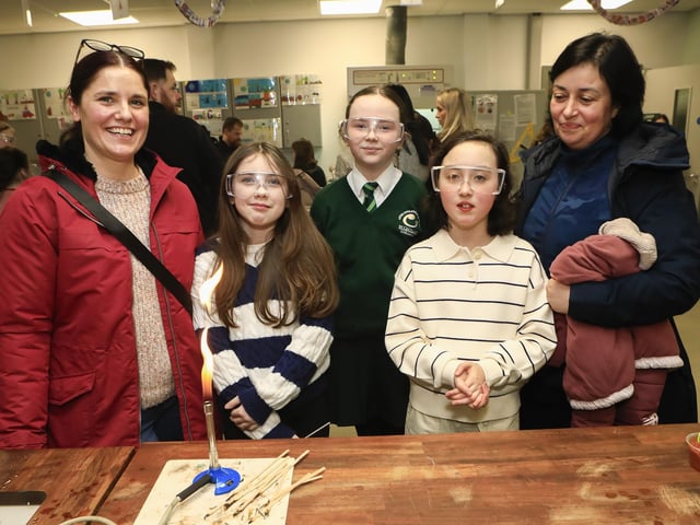 Student chaperone with parents and children at St. Cecilia’s College Open Night. (Photo - Tom Heaney, nwpresspics)