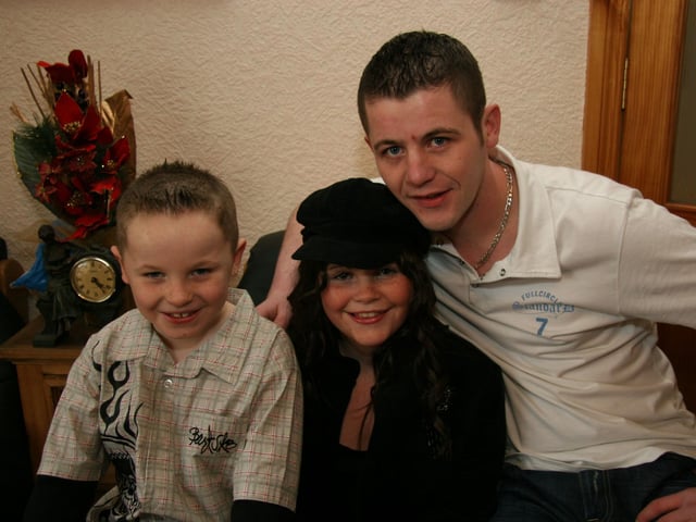 Megan pictured with her brothers DAvid and Conal as she celebrates her 13th birthday 0046JML