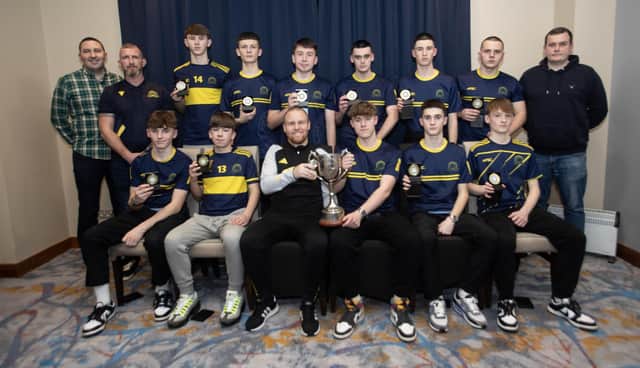 Ronan O'Donnell, Irish Football Association, special guest, presenting Don Boscos Colts u-16s with the Summer Cup at the D&D Youth Awards at the City Hotel on Friday night last. Included are coaches Emmet Kirk, Davy Ferguson and Brian McCay.