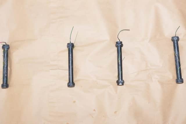 Four pipe bombs that were discovered in the City Cemetery.
