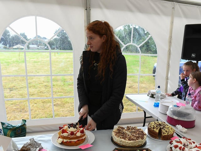 Sampling cake at the Muff Féile. Photo: George Sweeney
