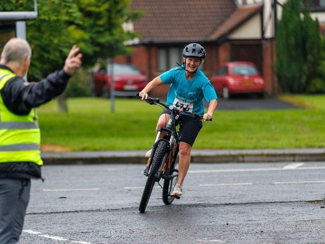 Heading for the finishing line of the Bogside & Brandywell Health Forum Danny Quigley 'Try-a-Tri' triathlon. (Photo: Micam Photography)