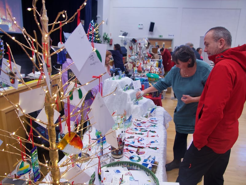 People enjoying the St. Mary's College Christmas Fair.