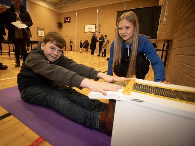 Drumahoe PS pupil Scott Hannah tests his fitness under the guidance of Ava Colgan.
