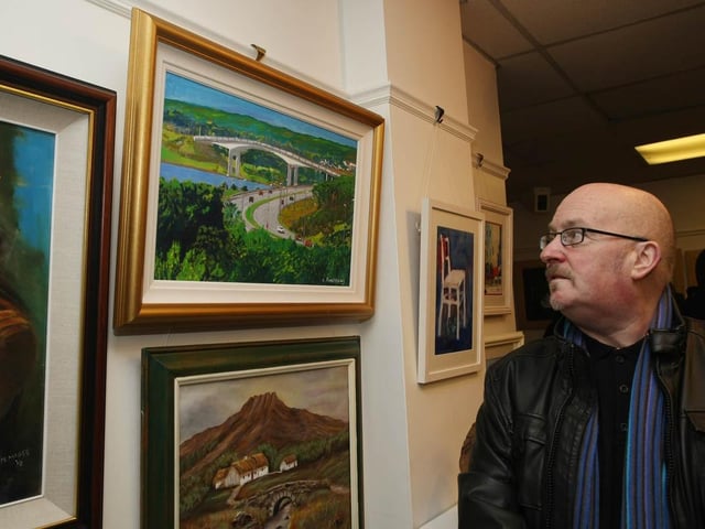 Chris Armstrong, with one of his paintings, at the Eden Arts Centre, end of term exhibition. 0604GM02EDEN