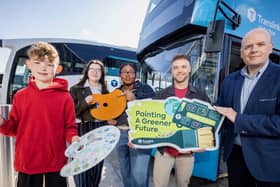 Pictured at the launch are John Thompson, Head of Safety and Corporate Responsibility, Translink; Rory Quigg, Artist & Illustrator, Rory Quigg Illustration; Henry (red jumper), Ella (grey t-shirt, navy jacket), and Rebecca (light grey shirt, brown jacket).
