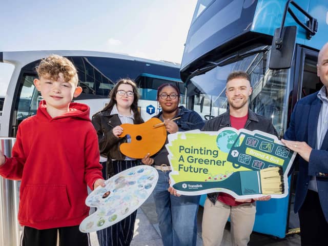 Pictured at the launch are John Thompson, Head of Safety and Corporate Responsibility, Translink; Rory Quigg, Artist & Illustrator, Rory Quigg Illustration; Henry (red jumper), Ella (grey t-shirt, navy jacket), and Rebecca (light grey shirt, brown jacket).