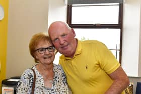 Stephen Butler who recently retired after working 38 years as a postman with his wife Una  at an appreciation celebration held in the Culmore Community Hub.  Photo: George Sweeney