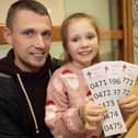 St. Joseph's Boys School teacher Emmett McGinty pictured with his daughter Layla at the school's Wheel of Fortune' on Thursday night.