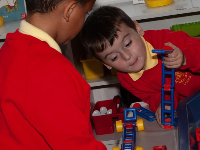 Lochlainn and Fionn busy designing a set of steps during play at Steelstown PS this week.:.