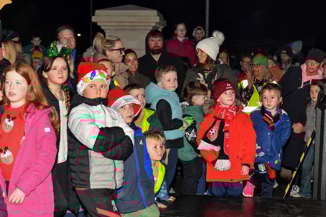 Families gather for the Elf Parade prior to the Christmas Lights switch on at the Community Hub on Friday night. Photo: George Sweeney