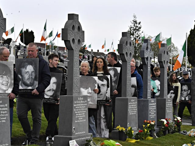 Photographs of IRA volunteers are carried to the Republican Plot, in the City Cemetery, during the 109th anniversary of the Easter Rising, on Sunday afternoon. Photo: George Sweeney