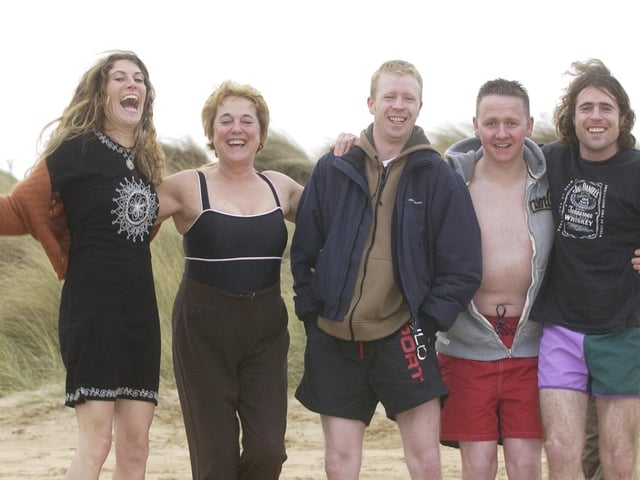 From left, Catherine Ross, Paula Ross, Stephen Houston, Ciaran Dempsey, and John Ross. (0301PG05) : Culdaff New Year's Day Swim in 2006.