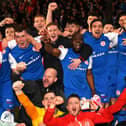 Former Derry City midfielder Joe Thomson celebrates with his Larne teammates after winning their first league title. Photo by INPHO/Stephen Hamilton