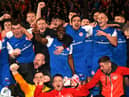 Former Derry City midfielder Joe Thomson celebrates with his Larne teammates after winning their first league title. Photo by INPHO/Stephen Hamilton
