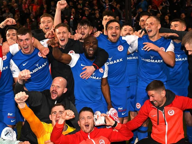Former Derry City midfielder Joe Thomson celebrates with his Larne teammates after winning their first league title. Photo by INPHO/Stephen Hamilton