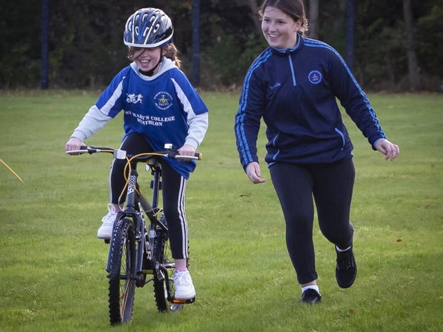 A helping hand to get started on the cycle leg for this young duathlete on Wednesday.