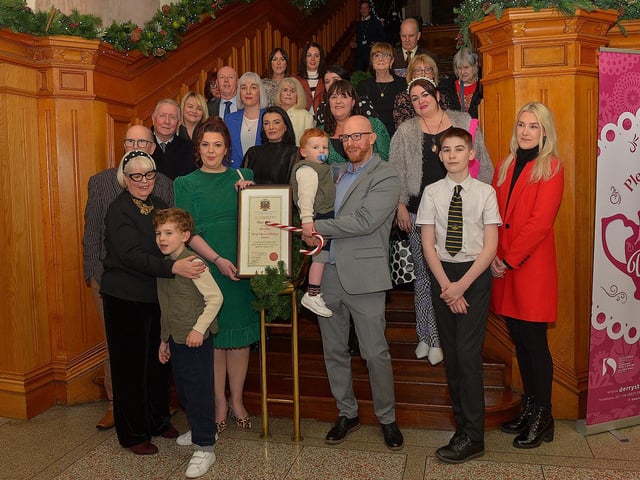 Lisa McGee, creator of Derry Girls, who was conferred with the Freedom of Derry City and Strabane by councillors yesterday evening pictured with family and friends in the Guildhall. Photo: George Sweeney. DER2249GS – 05