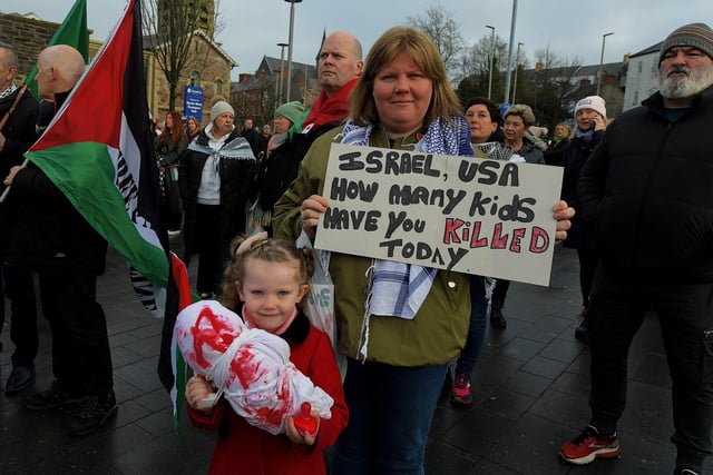 Thousands of protesters take part in a march and rally, in Derry on Saturday afternoon, calling for a ceasefire in Gaza. Many of these taking part carried dolls wrapped in a pillowcases to symbolise the thousands of Palestinian children who have recently lost their lives. Photo: George Sweeney