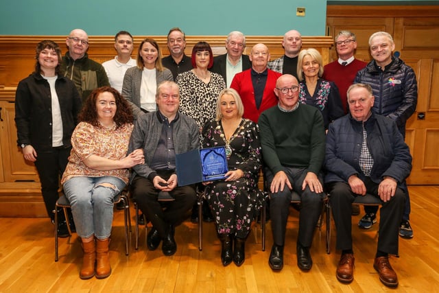 The Mayor of Derry City and Strabane, Councillor Sandra Duffy, making a presentation to Martin McConnellogue, at a reception in the Guildhall in recognition of his commitment to LGBT+ Rights and Trade Union Activism. Included are family and friends who attended the reception.