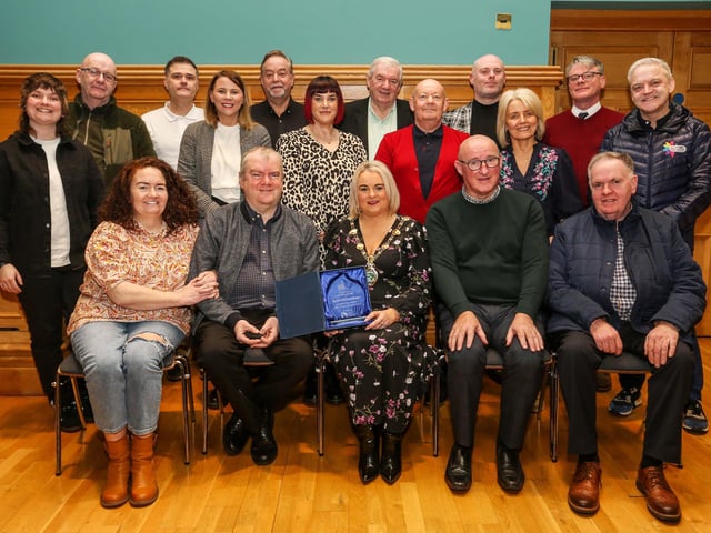 The Mayor of Derry City and Strabane, Councillor Sandra Duffy, making a presentation to Martin McConnellogue, at a reception in the Guildhall in recognition of his commitment to LGBT+ Rights and Trade Union Activism. Included are family and friends who attended the reception.