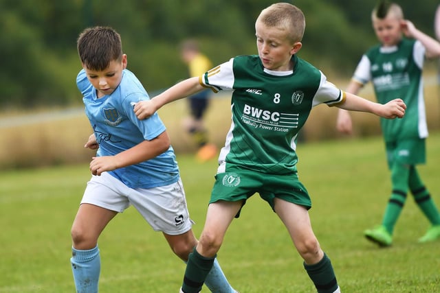 Brandon Abram, Ballymena United Academy, and Harley Mahon, Foyle Harps Colts, tussle for the ball during their Under-9 match.