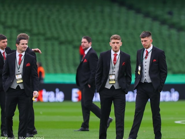 Ronan Boyce, Ciaran Coll and Jack Lemoignan get a feel for the pitch before the big match.